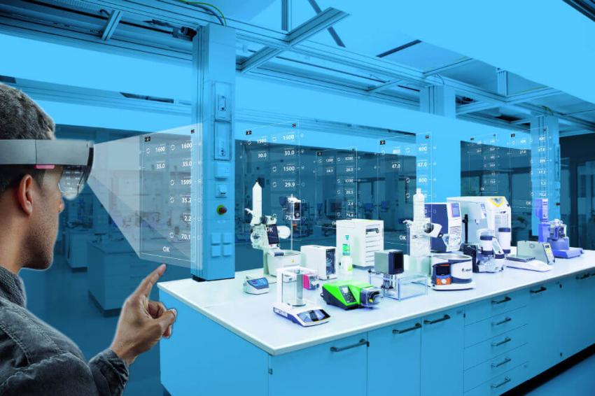 A laboratory setting with various scientific instruments and equipment on a workbench. A person is interacting with a virtual interface using augmented reality (AR) glasses. The AR interface displays various numerical data and measurements related to the equipment on the bench. The laboratory is well-lit with a blue color scheme, and the AR interface overlays the real-world environment, providing additional information and control options. The numerical values displayed on the AR interface range from 1600 to 3.0, along with an 'OK' status.